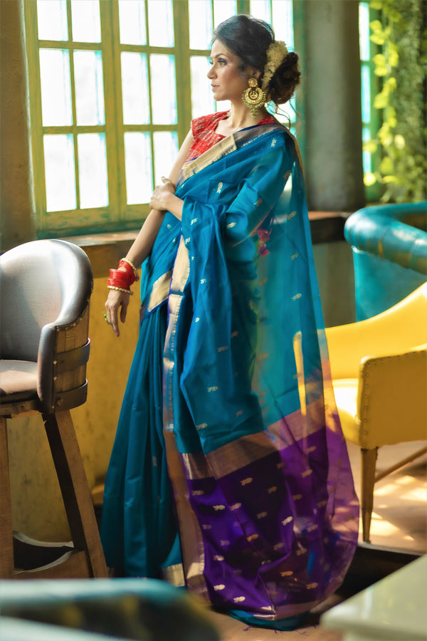 blue maheshwari saree with gold bordr and motifs
