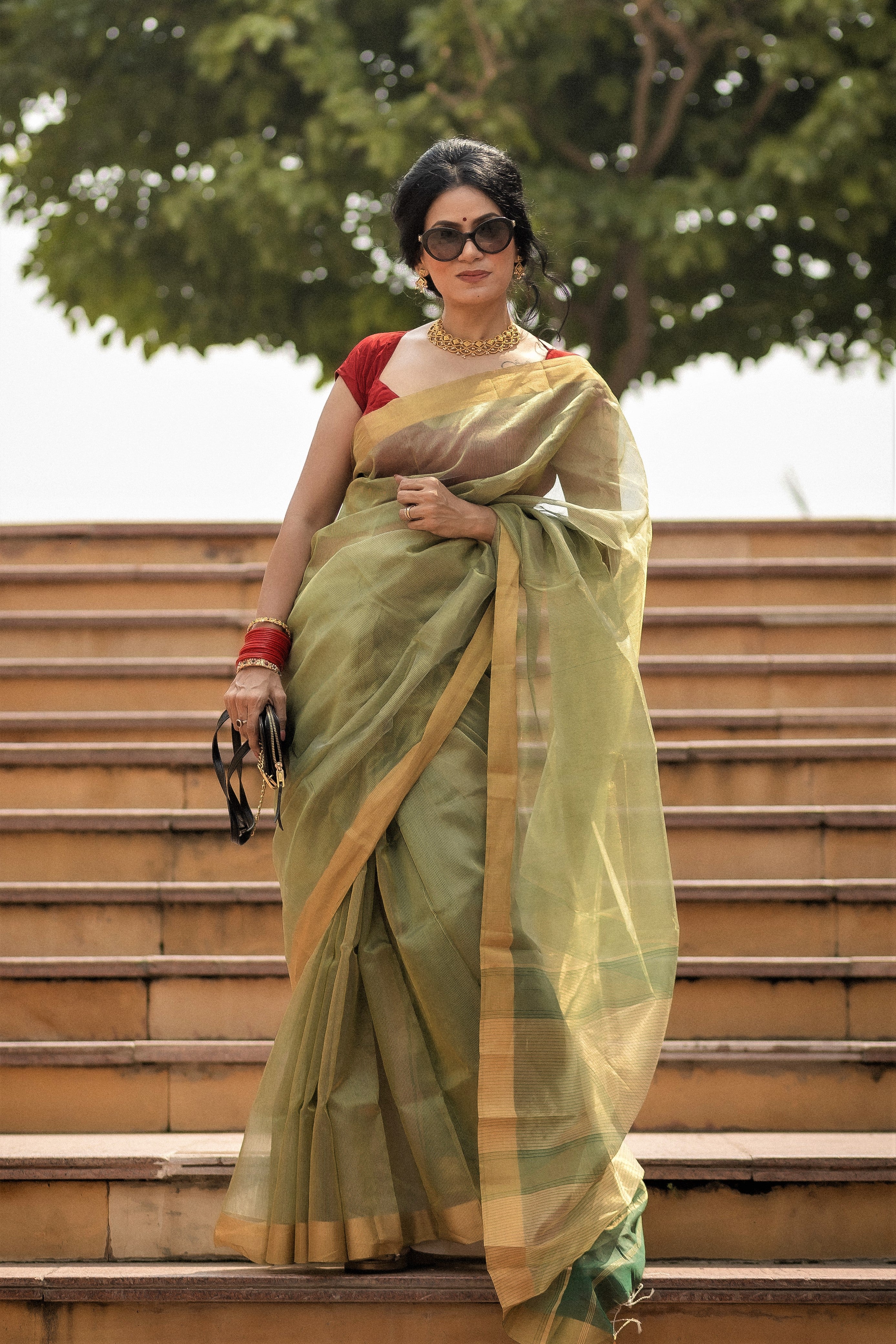 Green maheshwari saree with zari lines all over